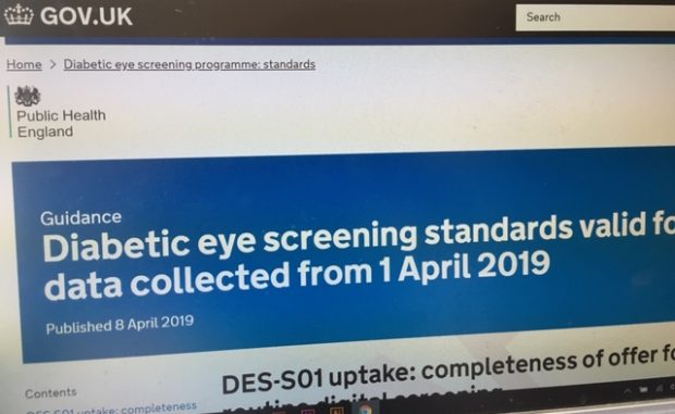 Computer screen displays the new diabetic eye screening standards page on GOV.UK