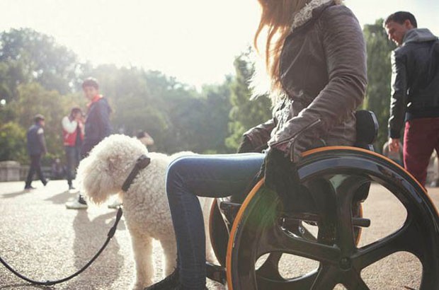 Image of female in the Carbon Black wheelchair.