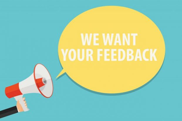 Megaphone with the words 'we want your feedback'