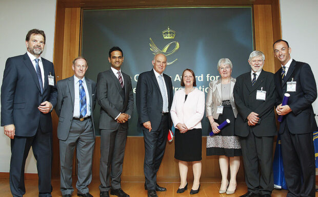 Vince Cable with winners of the Queen's Awards.