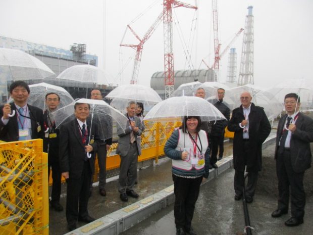 Umbrellas were required for members of the panel visiting Fukushima