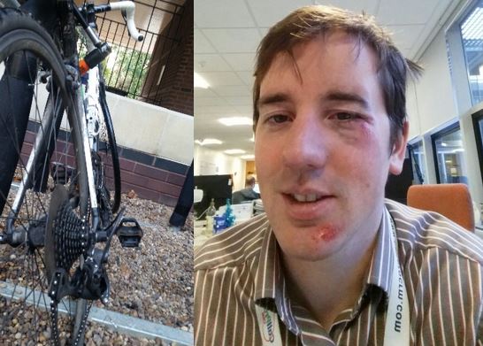 Image of broken bike and Chris Smith.
