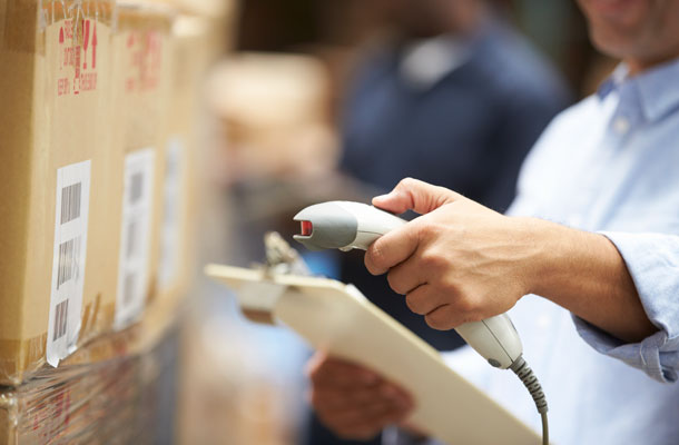 Image of warehouse employee scanning a barcode.
