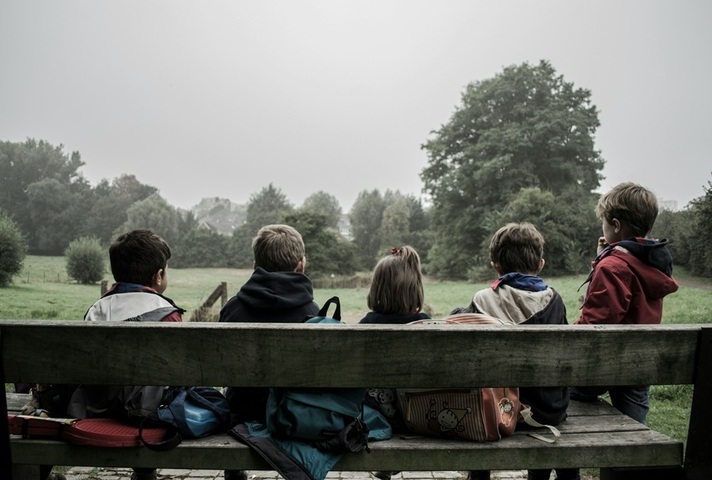 Children on a bench. Credit: Piron Guillaume, Unsplash
