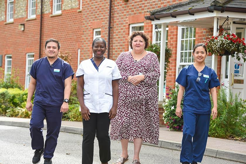 Professor Deborah Sturdy poses with staff from Watlington Nursing Home, 2023