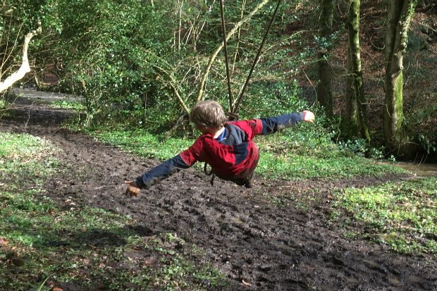Kid on a swing