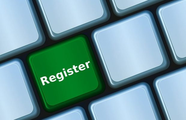 Keyboard with green 'register' key
