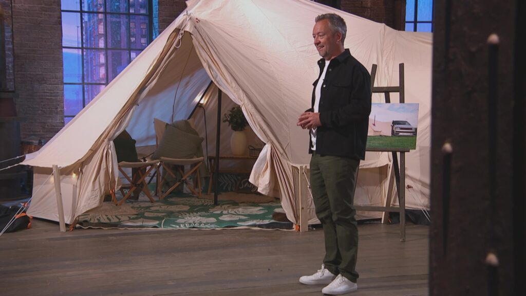 An image of James Martin from Glawning stood next to his awning in the Den.