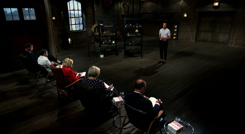 Daniel Gray standing in front of the Dragons