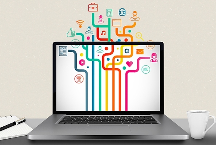 Decorative illustration of a laptop screen with colourful icons