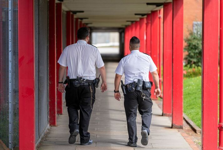 Prison Officers walking