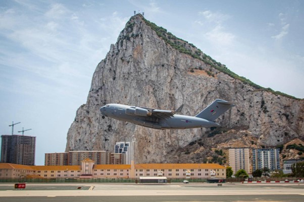 RAF plane taking off with the Rock of Gibraltar in the background