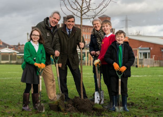 Minister Rutley with Tree Champion Sir William Worsley and pupils from St Andrew’s CE Primary School. Photo credit: The Woodland Trust.