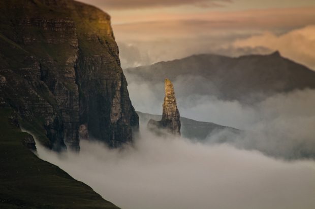 Cliffs emerging from the mist.