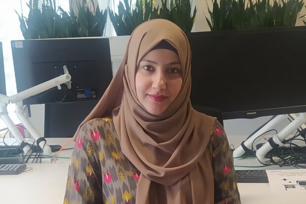 Ayesha Azar at her workstation.