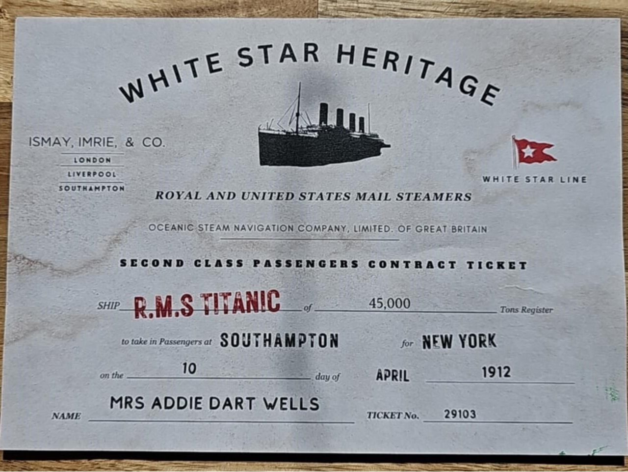 A boarding pass for Miss Addie Darts Wells from the Titanic Exhibition