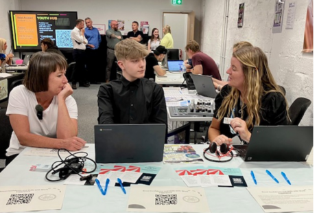 Welsh Secretary Jo Stevens talking with people around a table at Port Talbot Youth Hub