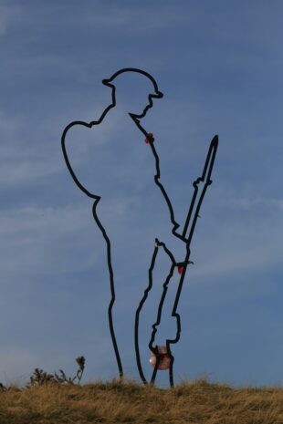 Picture outline of a metal structure of a soldier