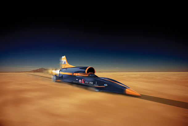 The Bloodhound car speeding across a barren landscape