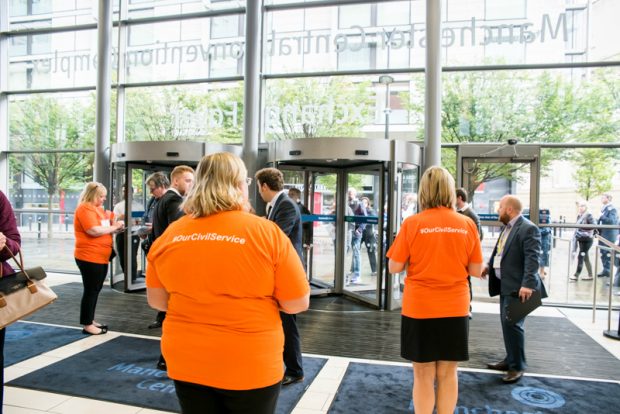 Civil Service Live volunteers welcoming delegates to Civil Service Live 2015