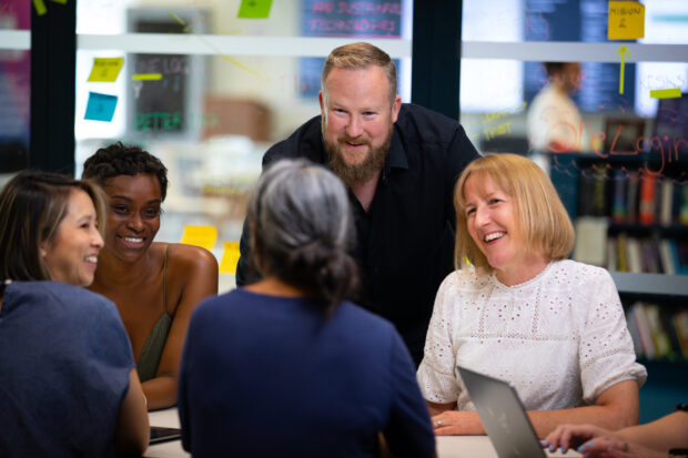 A photo of Government Digital and Data colleagues in discussion