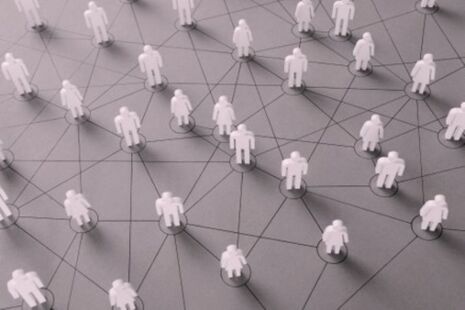Illustration of connected figures representing members of an advisory committee network.