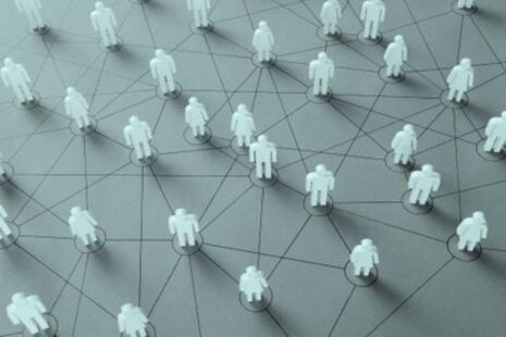 Illustration of connected figures representing members of an advisory committee network.