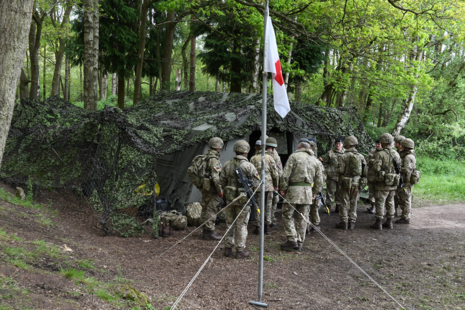 military medical personnel with tent