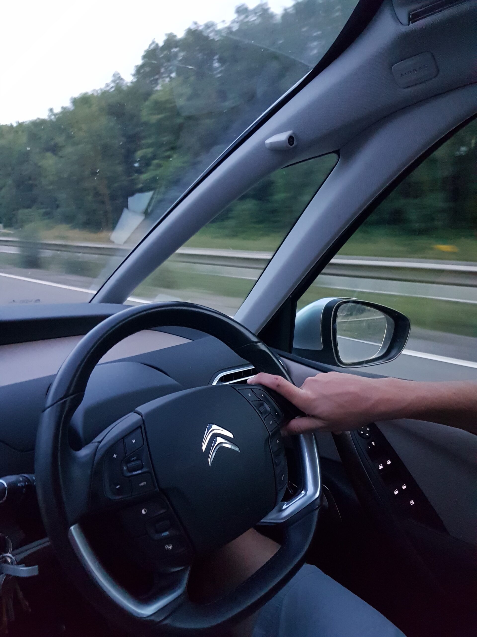 The inside of a car driving along the motorway.
