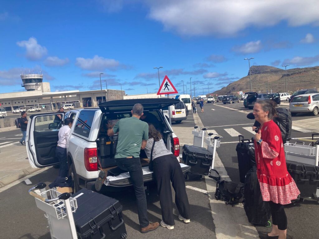 UKHSA microbiologists Clara Milroy and Kimberley Steeds, along with infection prevention and control expert Anthony Twyman, arrive in Saint Helena with the mobile laboratory