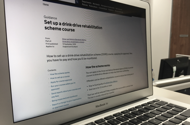 Macbook screen showing the set up a drink-drive rehabilitation scheme course on GOV.UK