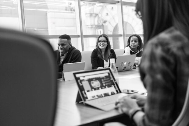 An image of a tech team working together