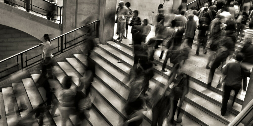 People walking on a staircase.