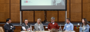 Data Impact Fellow panel of six people sat at a table