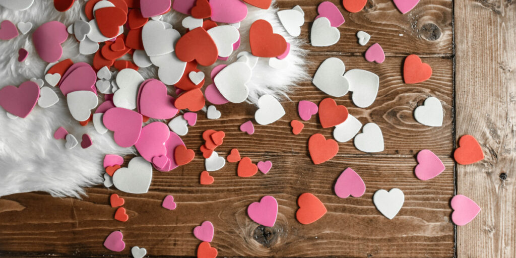 Decorative hearts lying on a table.