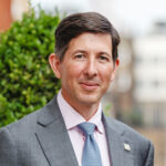Photograph of Dr Stephen Brien (Chair of the Social Security Advisory Committee)