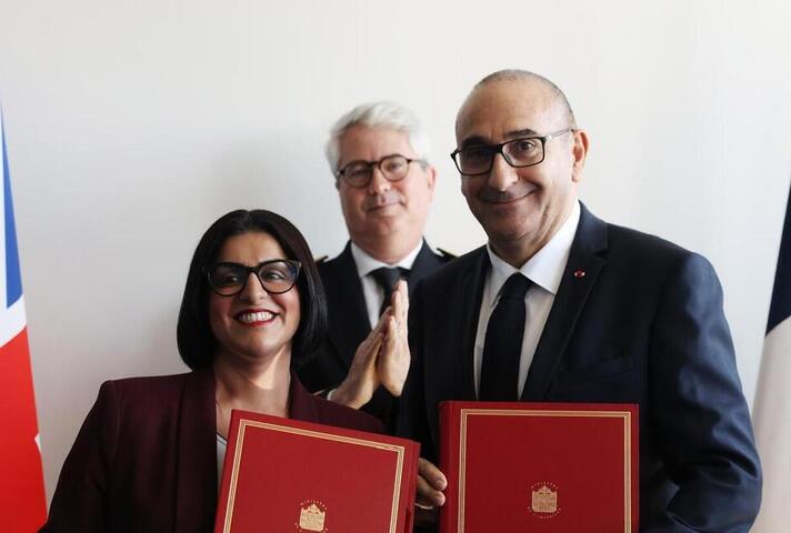 Image of Home Secretary and French politicians.