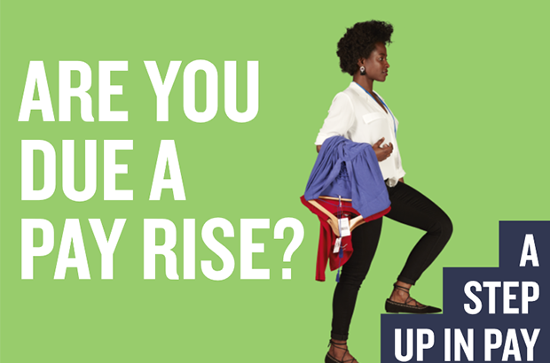Detail from the National Minimum Wage campaign. Shop worker holding dresses climbing stairs. Text says: "Are you due a pay rise? A step up in pay."