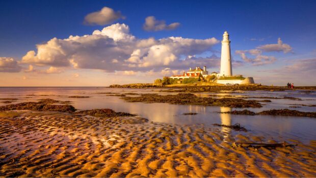 View of the Shore and the St Marys Lighthouse in the Distance, Whitley Bay, England, UK