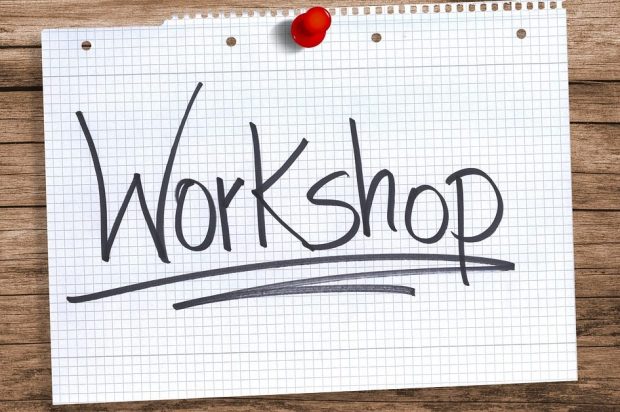 Image shows a paper with the writing workshop placed on a board