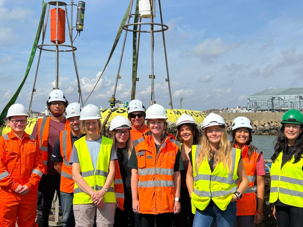 group of people wearing high his jackets and hard hats