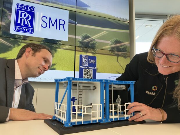 Andy Pynn and Saffron Price-Finnerty examine a model of the modules.