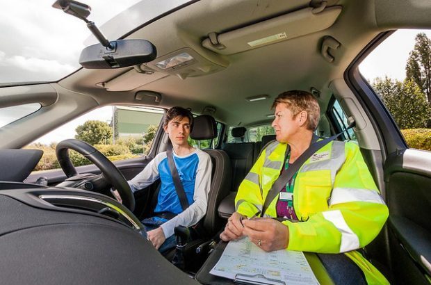 Approved driving instructor sat in a car with a pupil