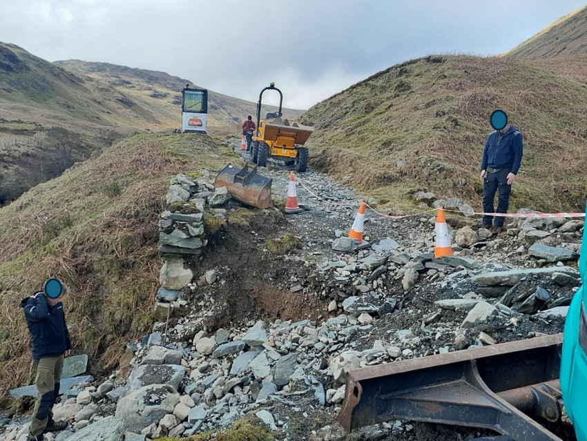 repairs in progress on collapsed pathway