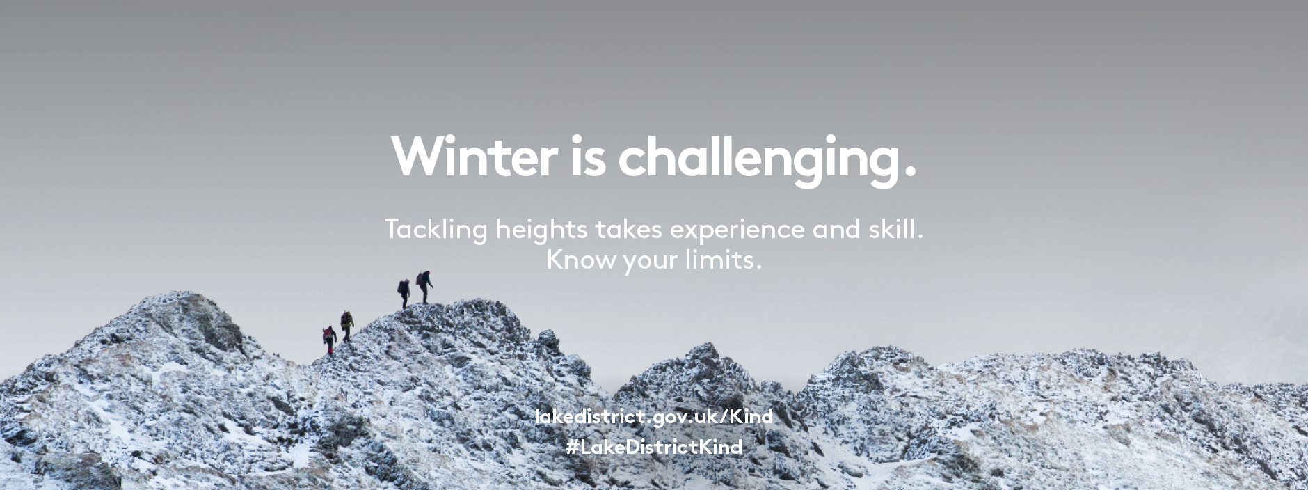 Rocky mountain top with people on top and text saying Winter is challenging. Tackling heights takes experience and skill. Know your limits.