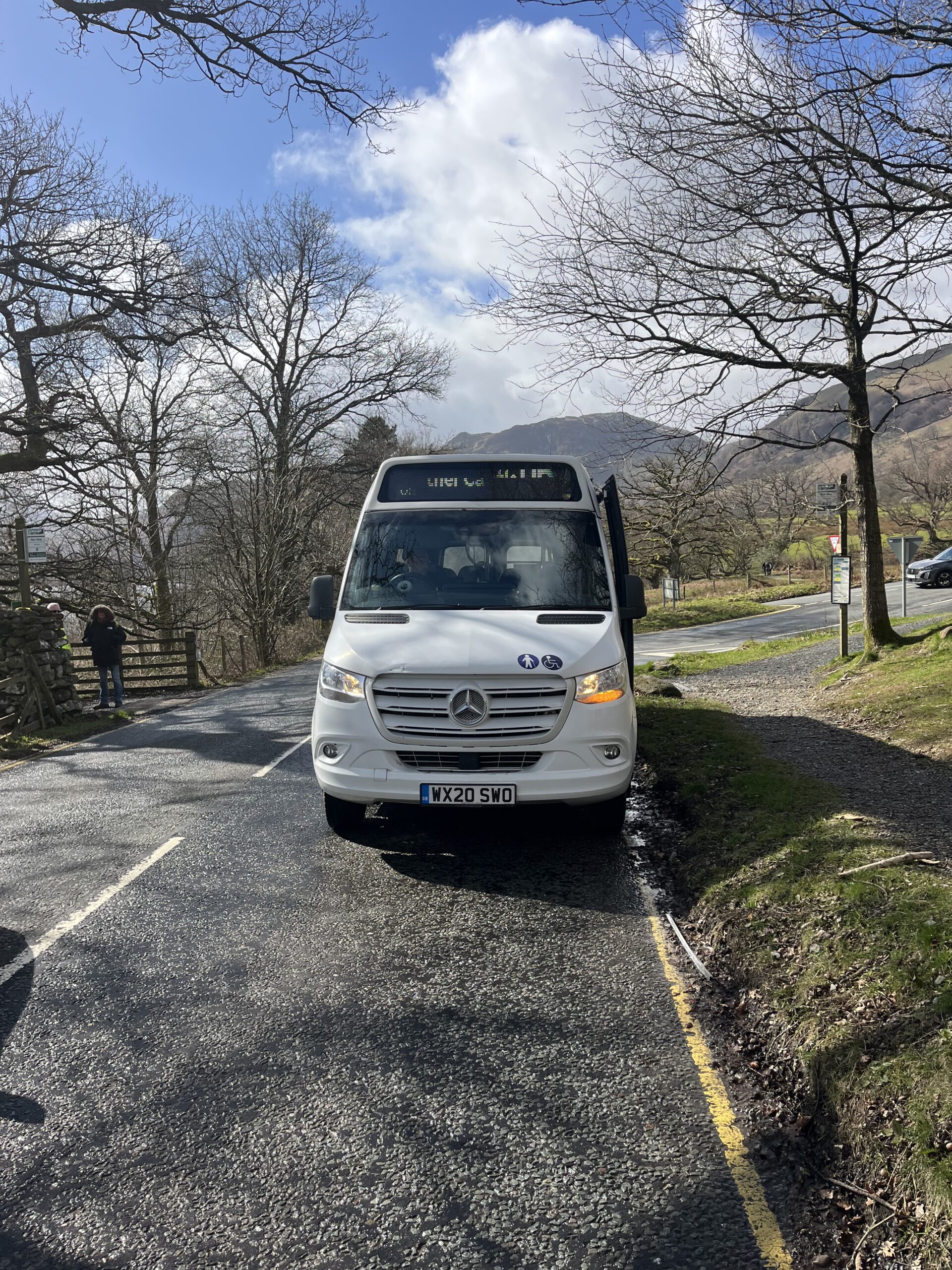 a picture of a mini bus on the side of the road