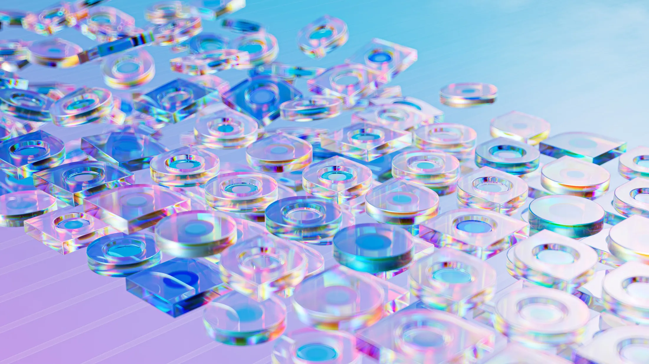 Rows of differently shaped and coloured glass discs demonstrating the creativity and order of AI
