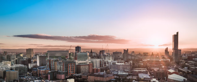 Aerial View of the Manchester Skyline at Sunrise