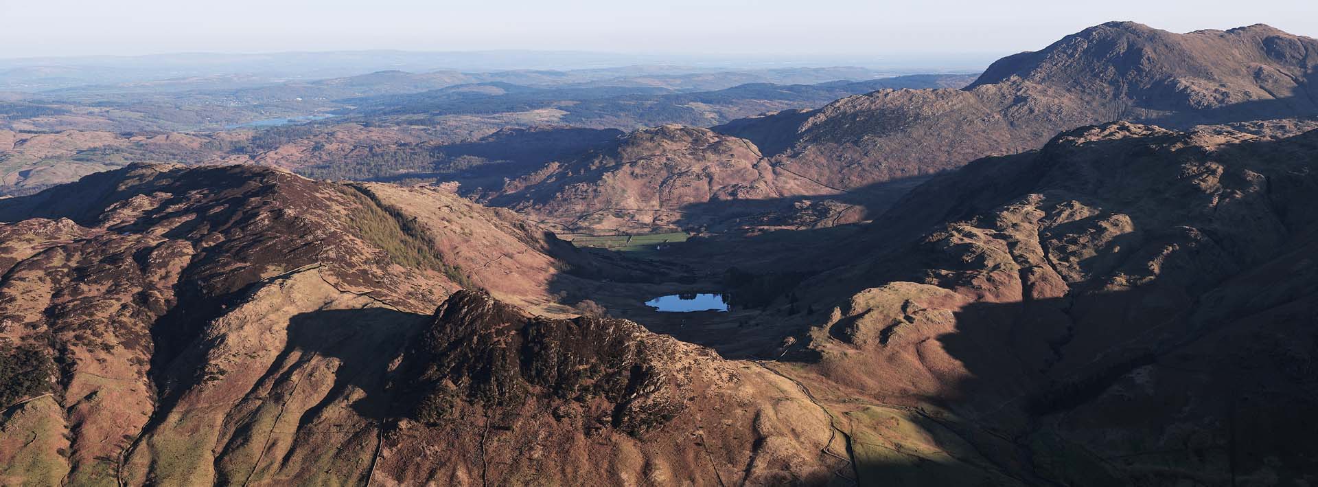 Panorama over the Langdale pikes with Blea tarn nestled in the middle
