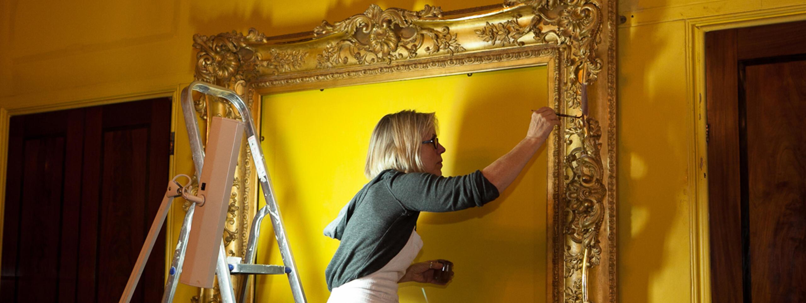 A conservator working on a frame in the Soane Museum. Donations are vital in allowing the conservation of objects in the collection